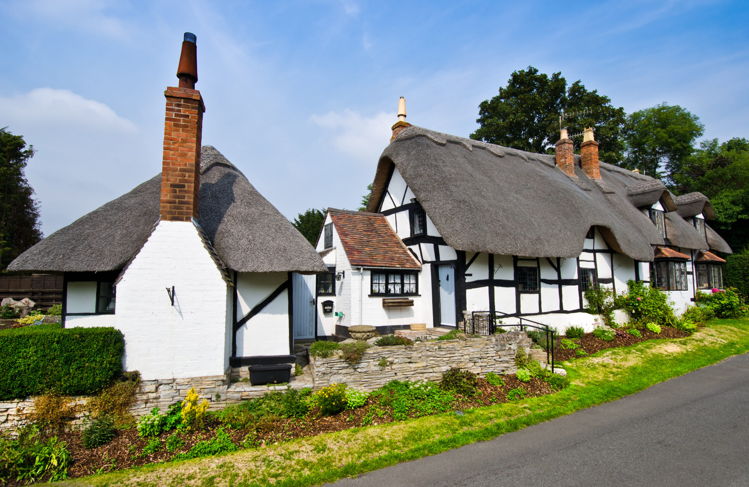 English Village Cottage Thatched roof house in the countryside